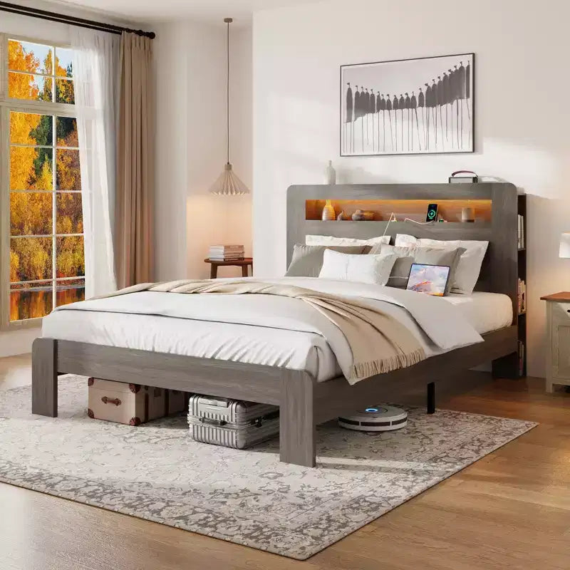 Lit plateforme moderne en bois avec tête de lit de rangement et lumière LED